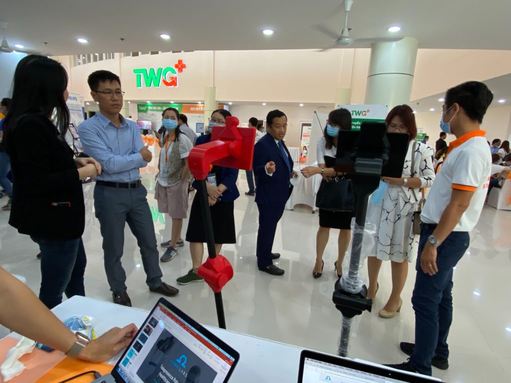Eric Nguyen, CIO of TWG, with the OhmniLabs team