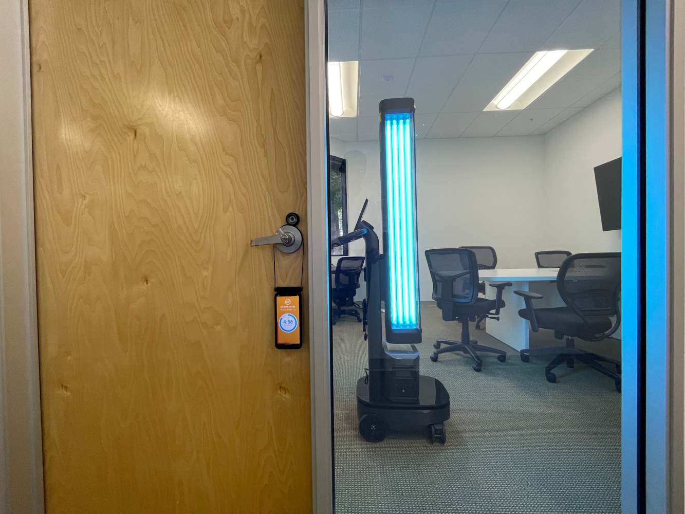 UV disinfection robots behind glass