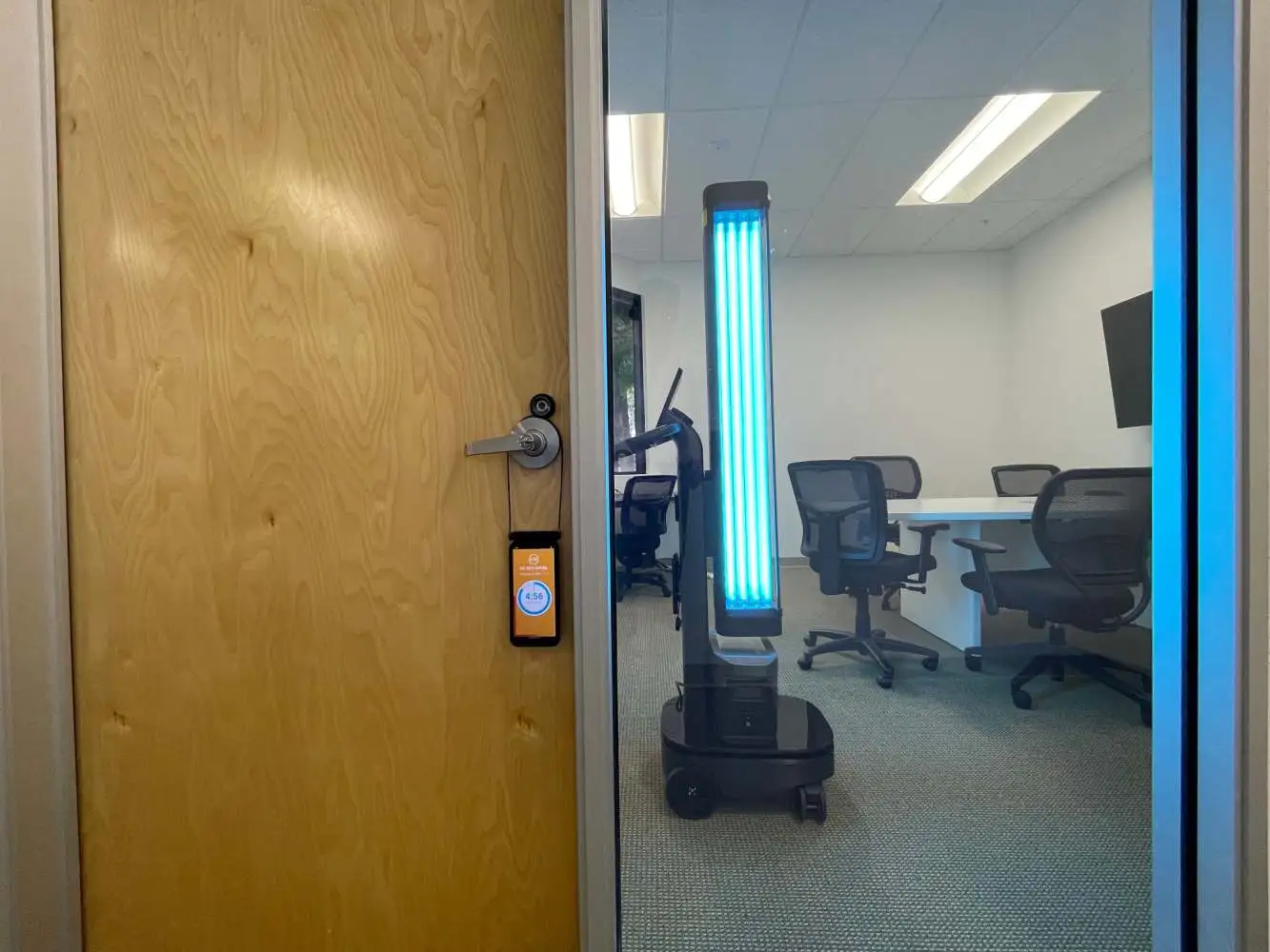 OhmniClean UV-C disinfection robot in an office