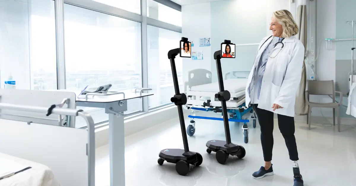 A nurse interacting with telehealth robots