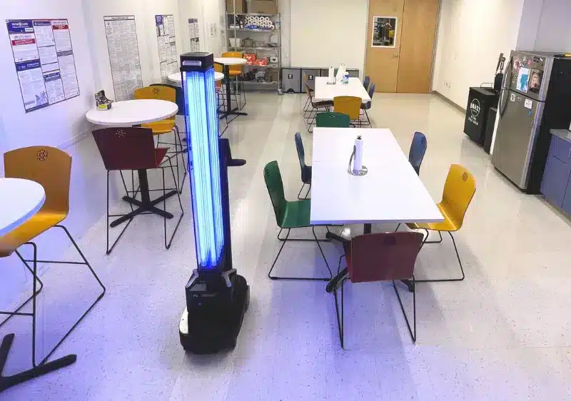 One of the OhmniClean disinfection robots in a kitchen.